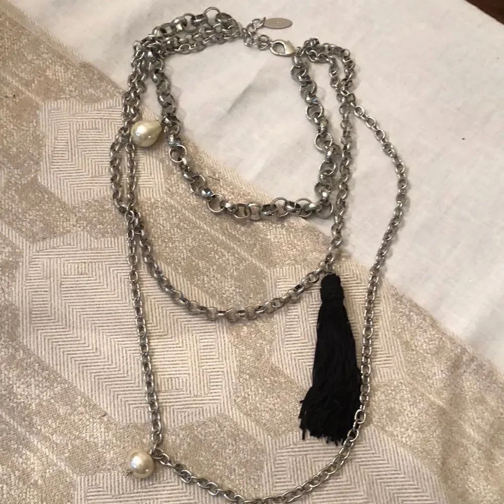 Chico’s Silver and pearl tassel large three tier statement necklace.